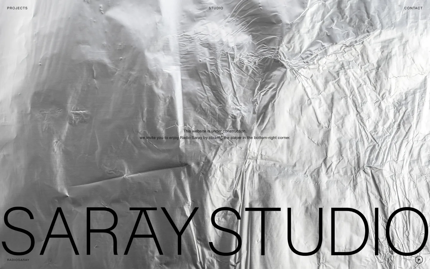 Saray Studio website: a giant wordmark over silver foil